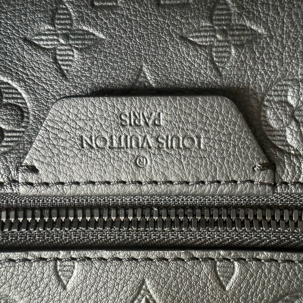LV DISCOVERY BACKPACK. Have box , bag and receipt.